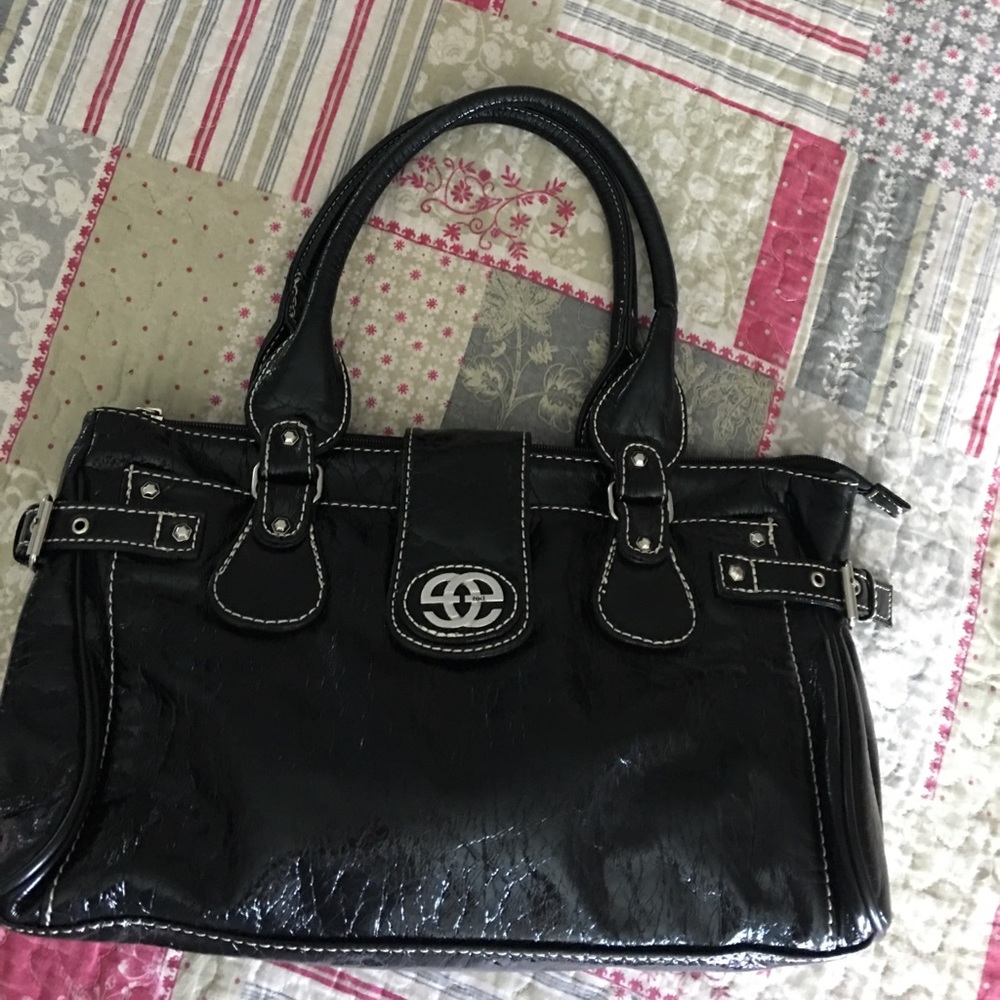 Red by marc ecko black bag. Perfect condition!